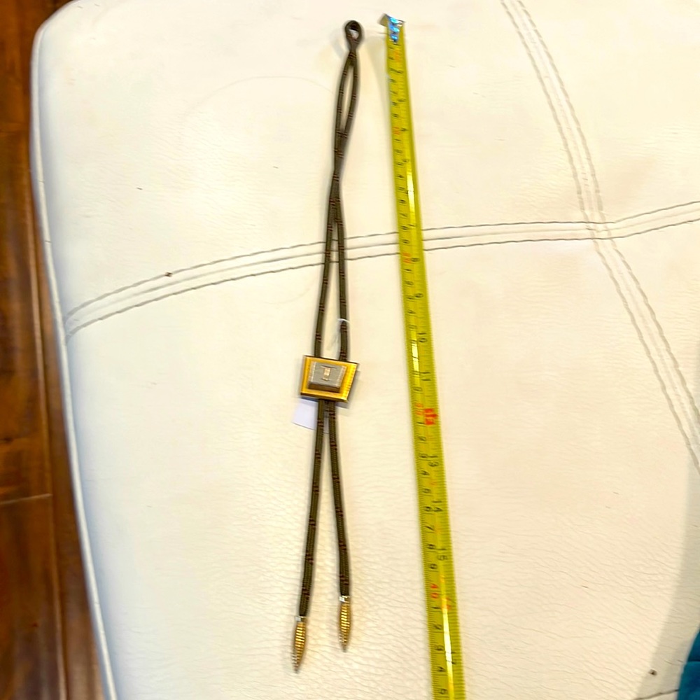 T monogram bolo tie